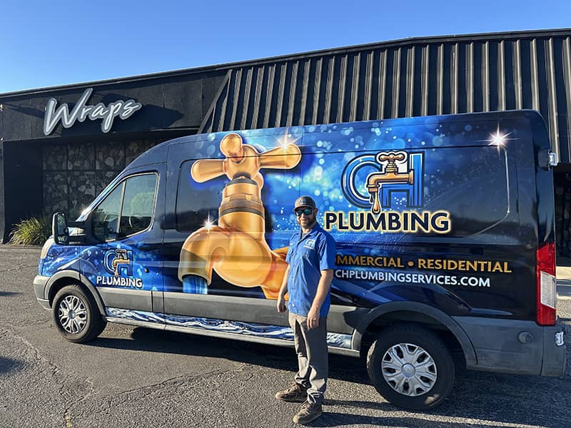 CH Plumbing wrapped van with the brass faucet graphic, Carlos Hernandez's shop